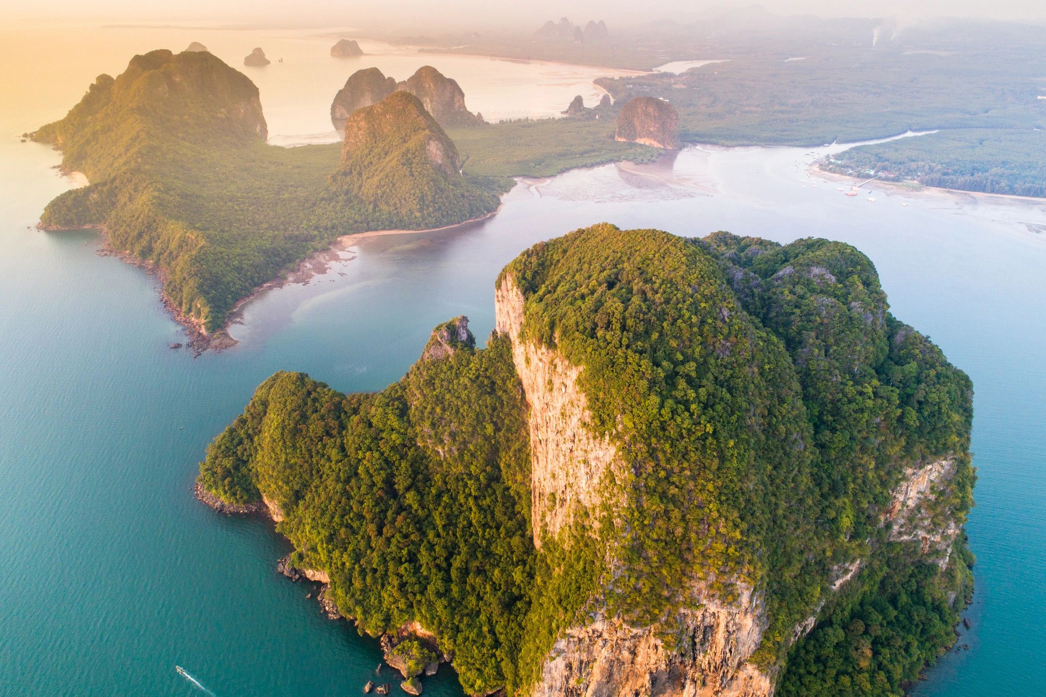 Aerial view of a tropical beach in Thailand at sunset