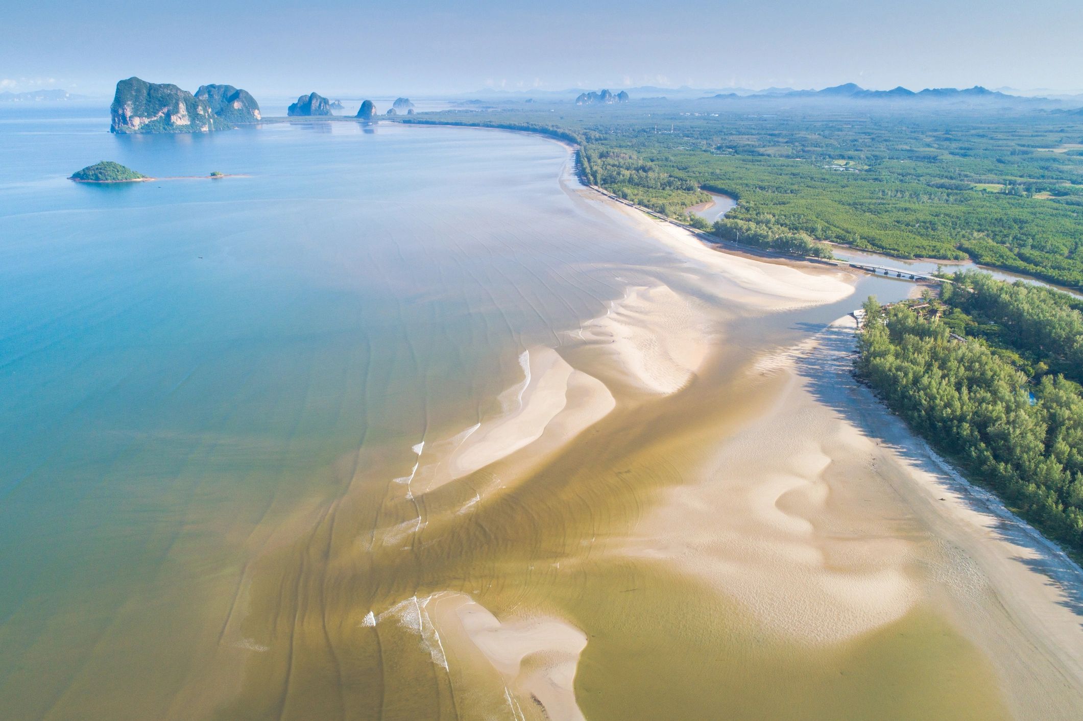 Aerial view of tropical beach at sunset in Thailand