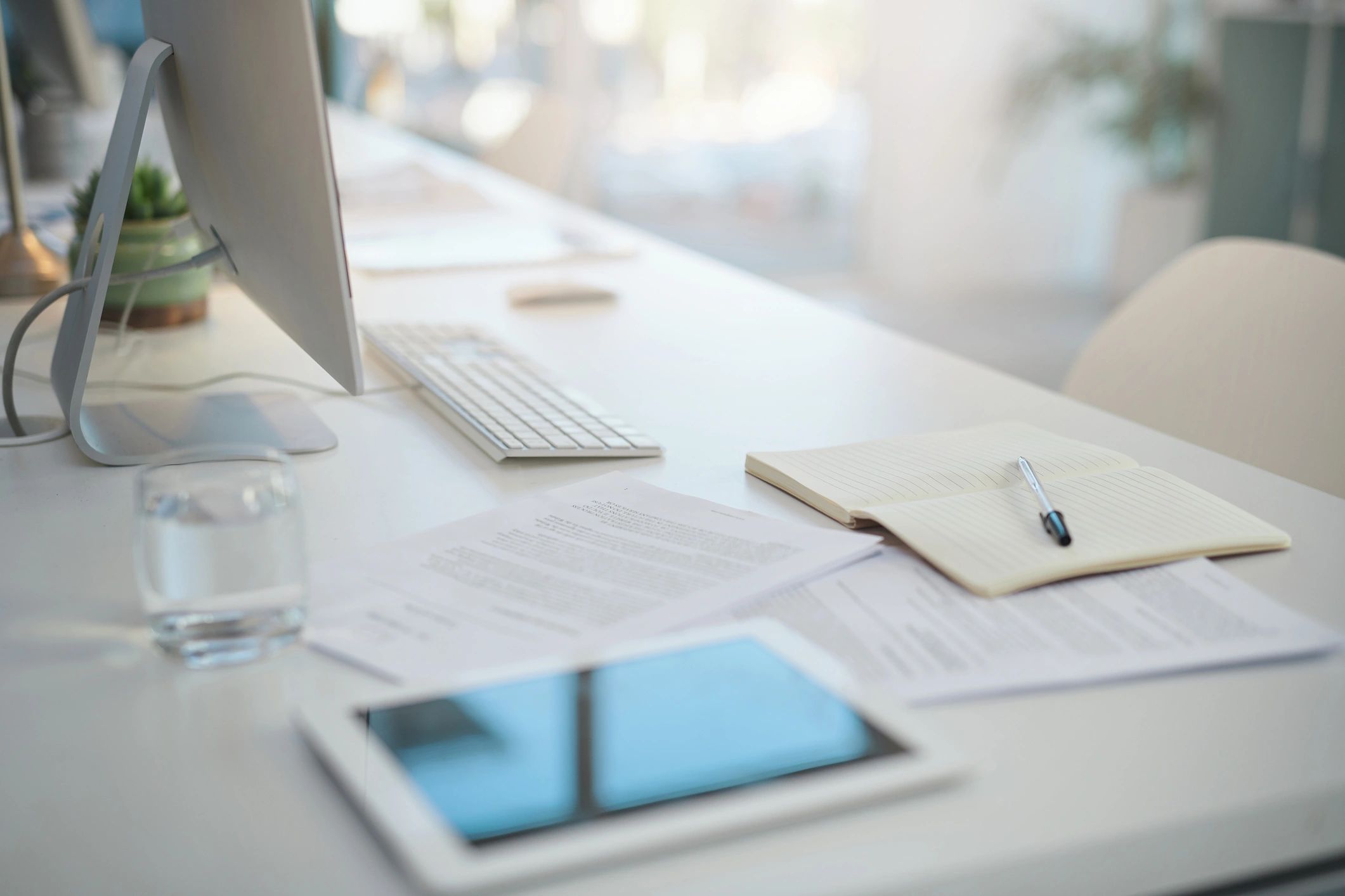 Desk with paperwork and office items