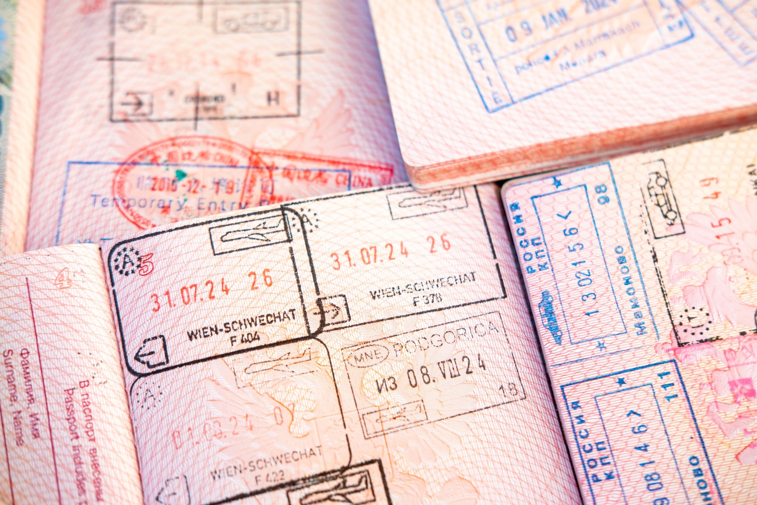 Passport pages with entry and exit stamps
