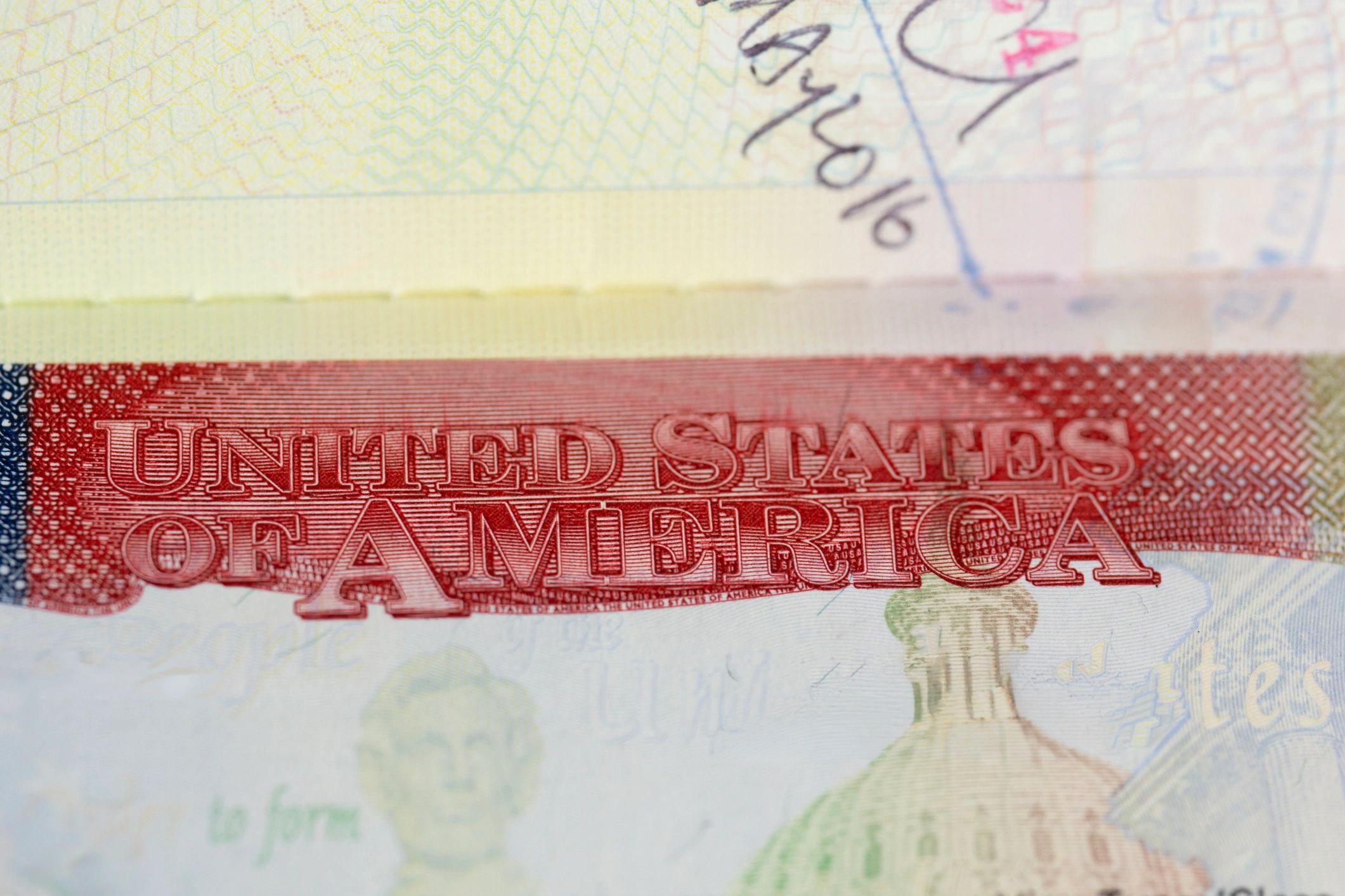 Close-up of a U.S. visa stamp on a passport page